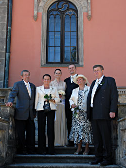 Bride's parents, newlyweds, groom's parents