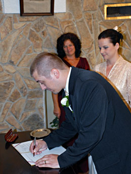 Groom signing